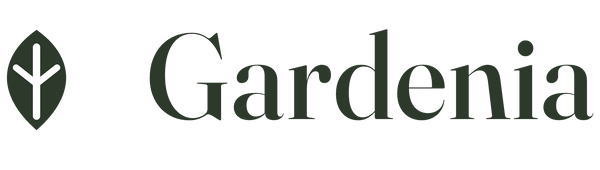 A dark green leaf logo next to the word 'Gardenia' in a serif typeface, centered on a plain white background.